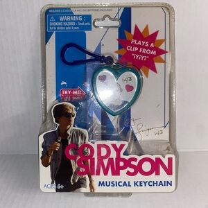 NIP Cody Simpson musical keychain (needs new battery)